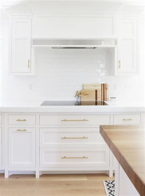 White Kitchen Cabinets With Long Brass Pulls Transitional This Month thumb 120 x 100