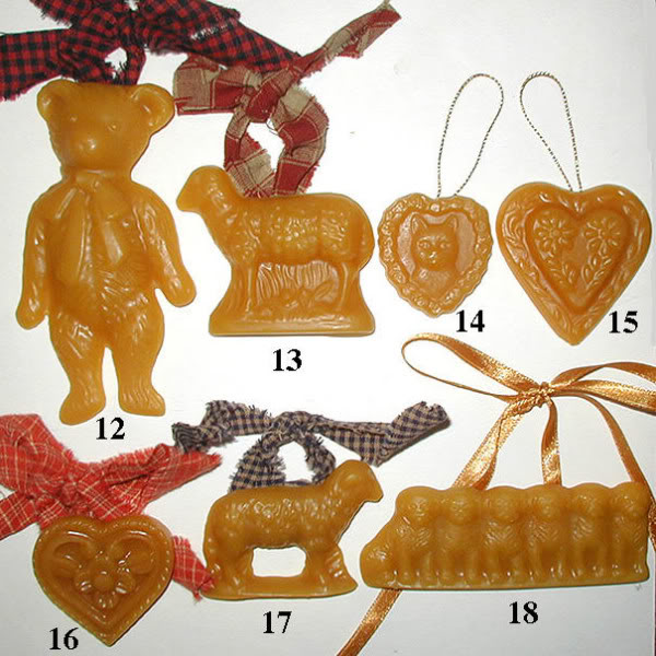 Handcrafted Beeswax Christmas Santa ornaments created from springerle