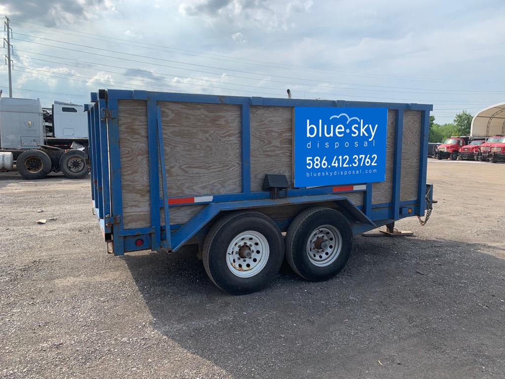 10 yard rubber tire dumpster rentals to keep driveway safe