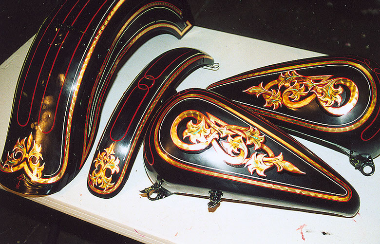 Pinstriping and gold leaf motorcycle tank (LONG ago i used to do this