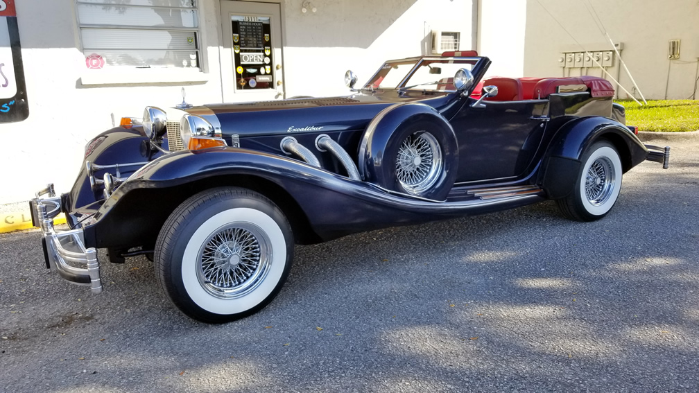 1984 Excalibur Series IV Phaeton 4 seater ,metallic Navy blue with red