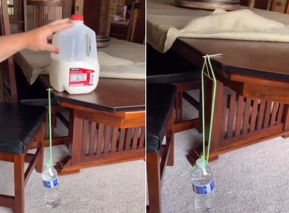 Physics! Guy Suspends Full Water Bottle From Edge Of Table With