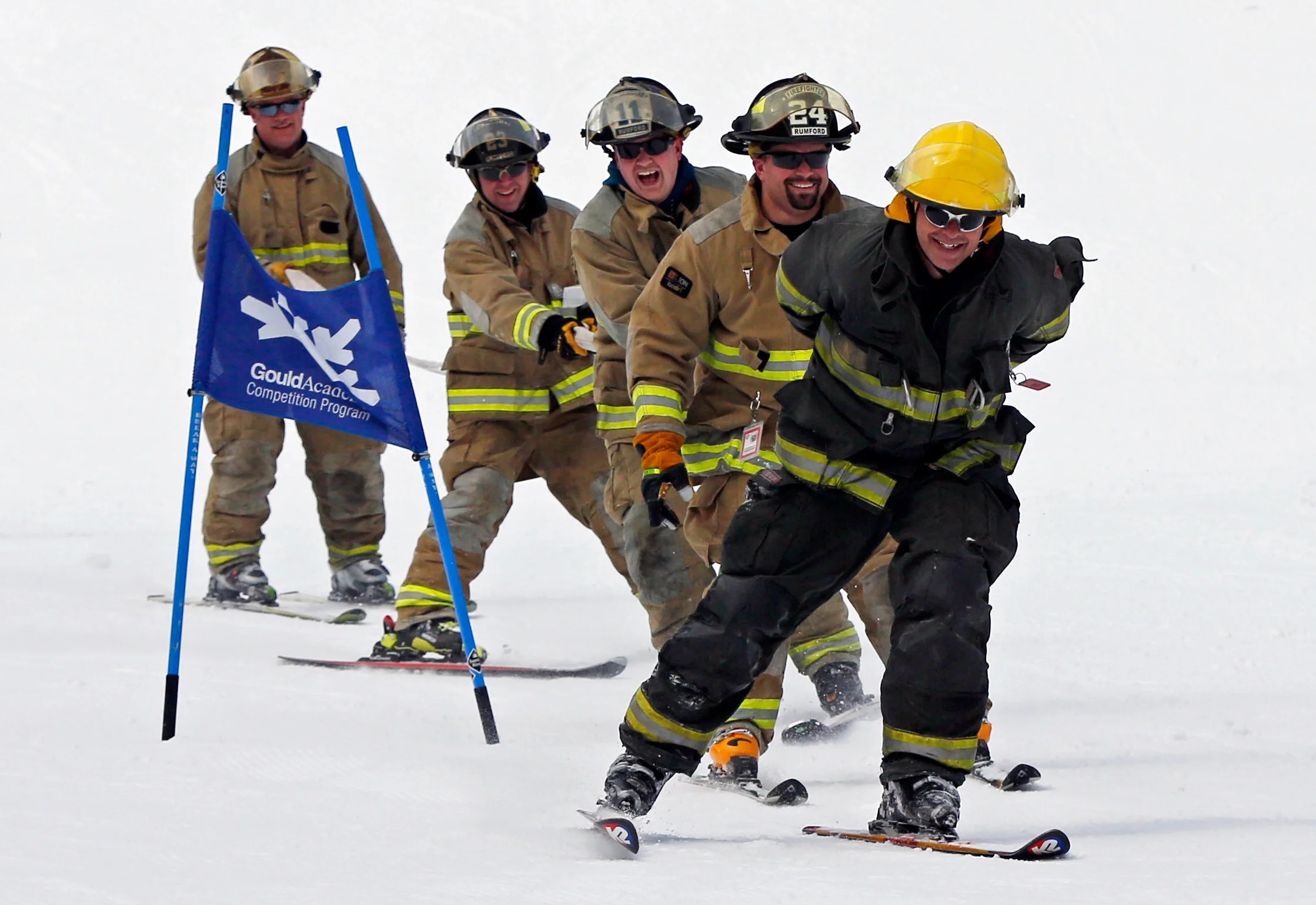 Firefighters hit the ski slopes at Sunday River in full gear, and with