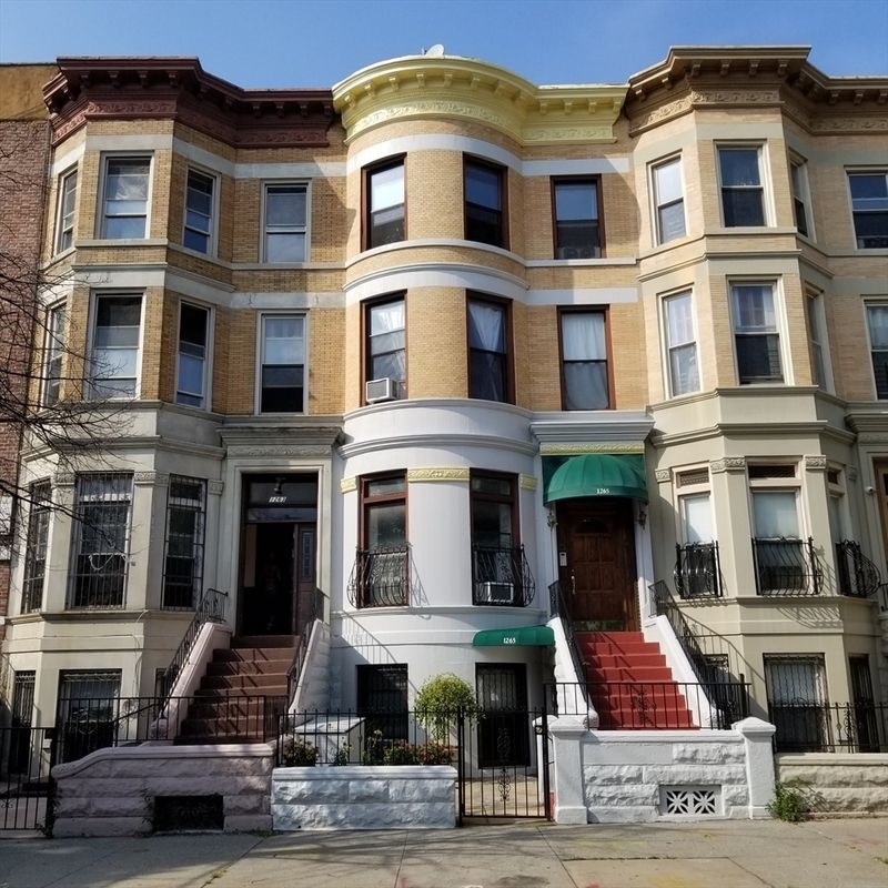 A three family in the Crown Heights North Historic District with two