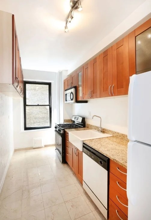 A big bathroom and separate sleeping space are selling points in this