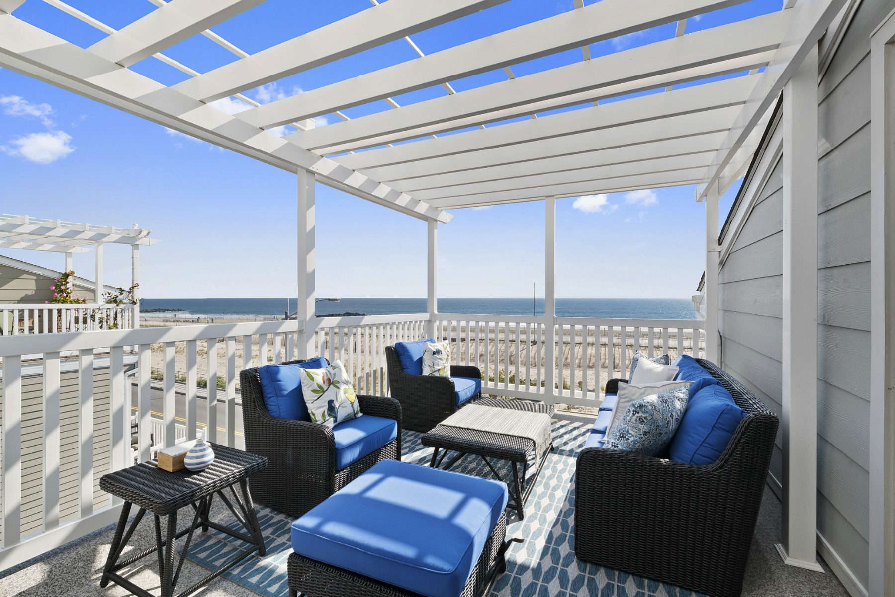 This Rockaways beach house is just steps from the water, and could rake