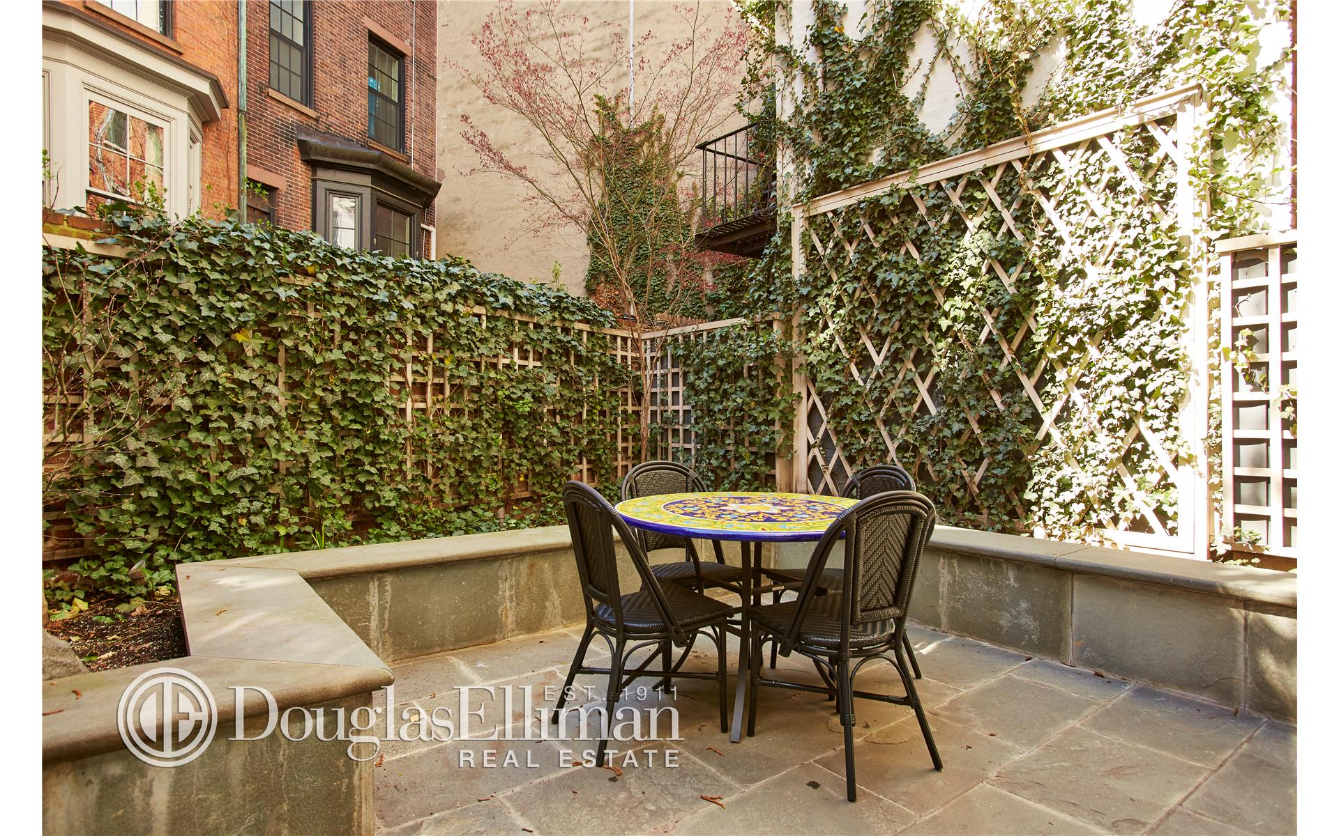 Live in an East Village townhouse crafted by the architect who designed