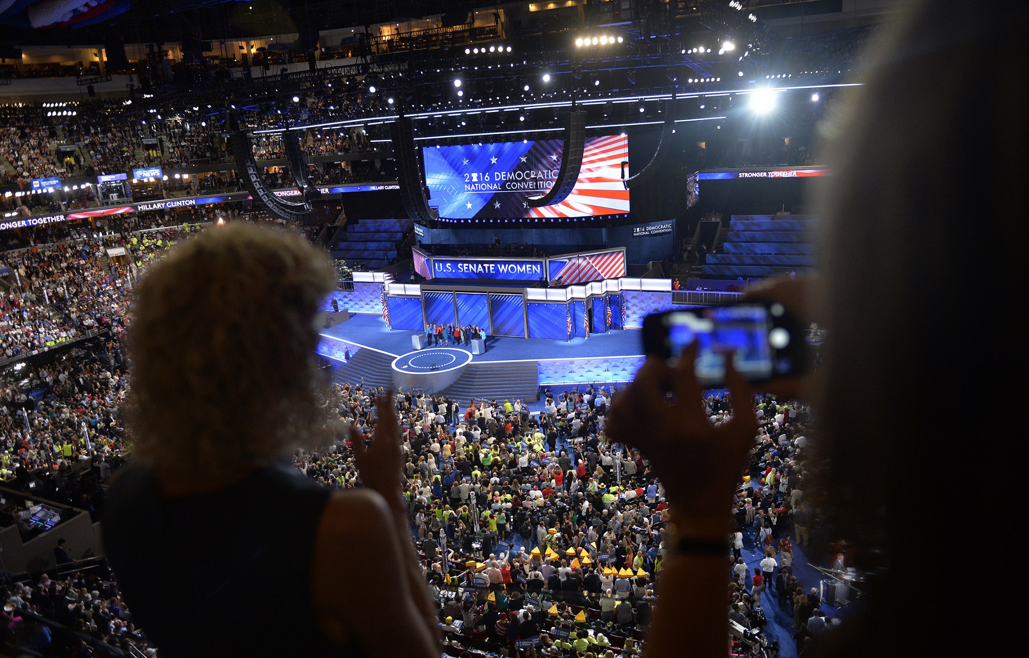 Delegates watch the Democratic Women of the Senate address at the Democratic National Convention in Philadelphia, Pennsylvania. U.S. July 28, 2016. REUTERS/Charles Mostoller - HT1EC7S1T9V1T