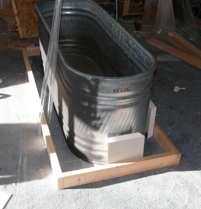 Construction of solar heated stock tank