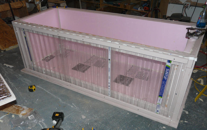 Construction of solar heated stock tank