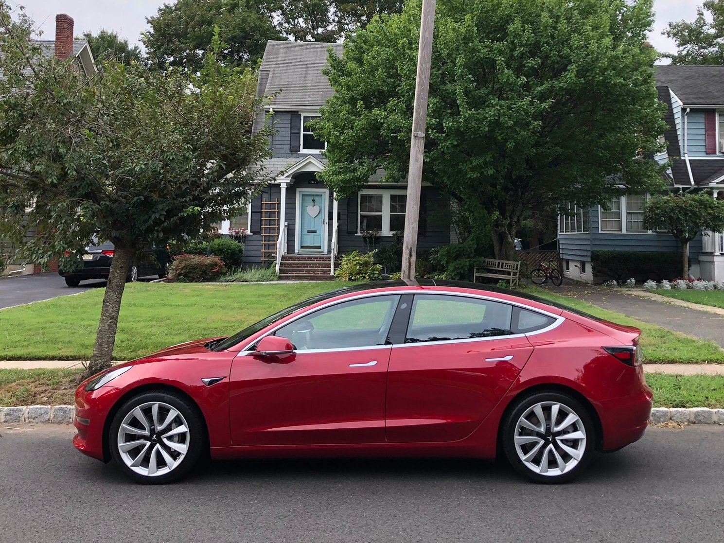 Tesla Model 3 and Nissan Leaf Plus compared photos features verdict