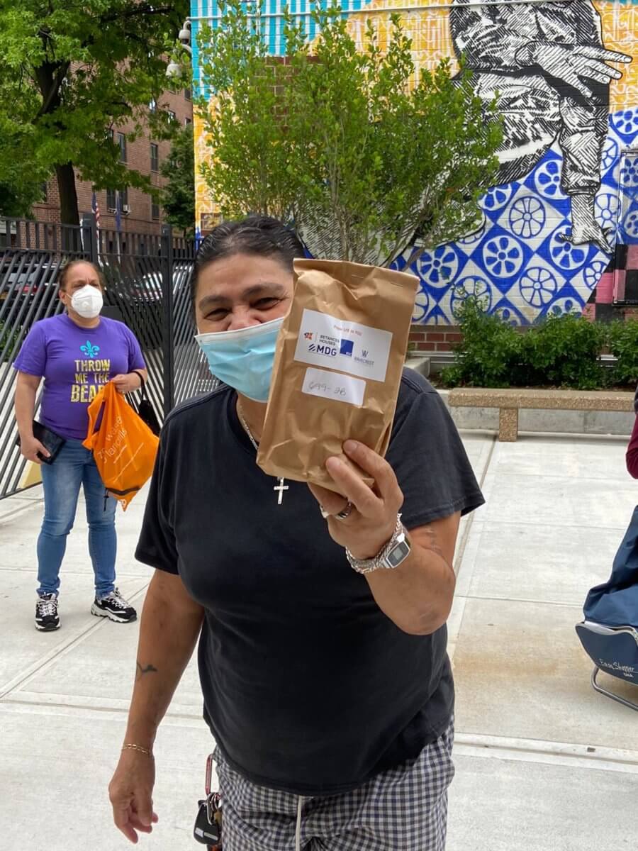 PHOTOS Face mask and hand sanitizer giveaway at the Betances Houses in