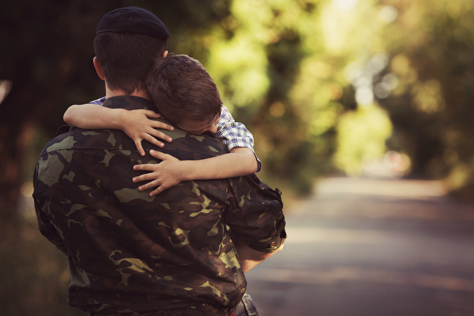 Little boy and soldier in a military uniform USC Center for