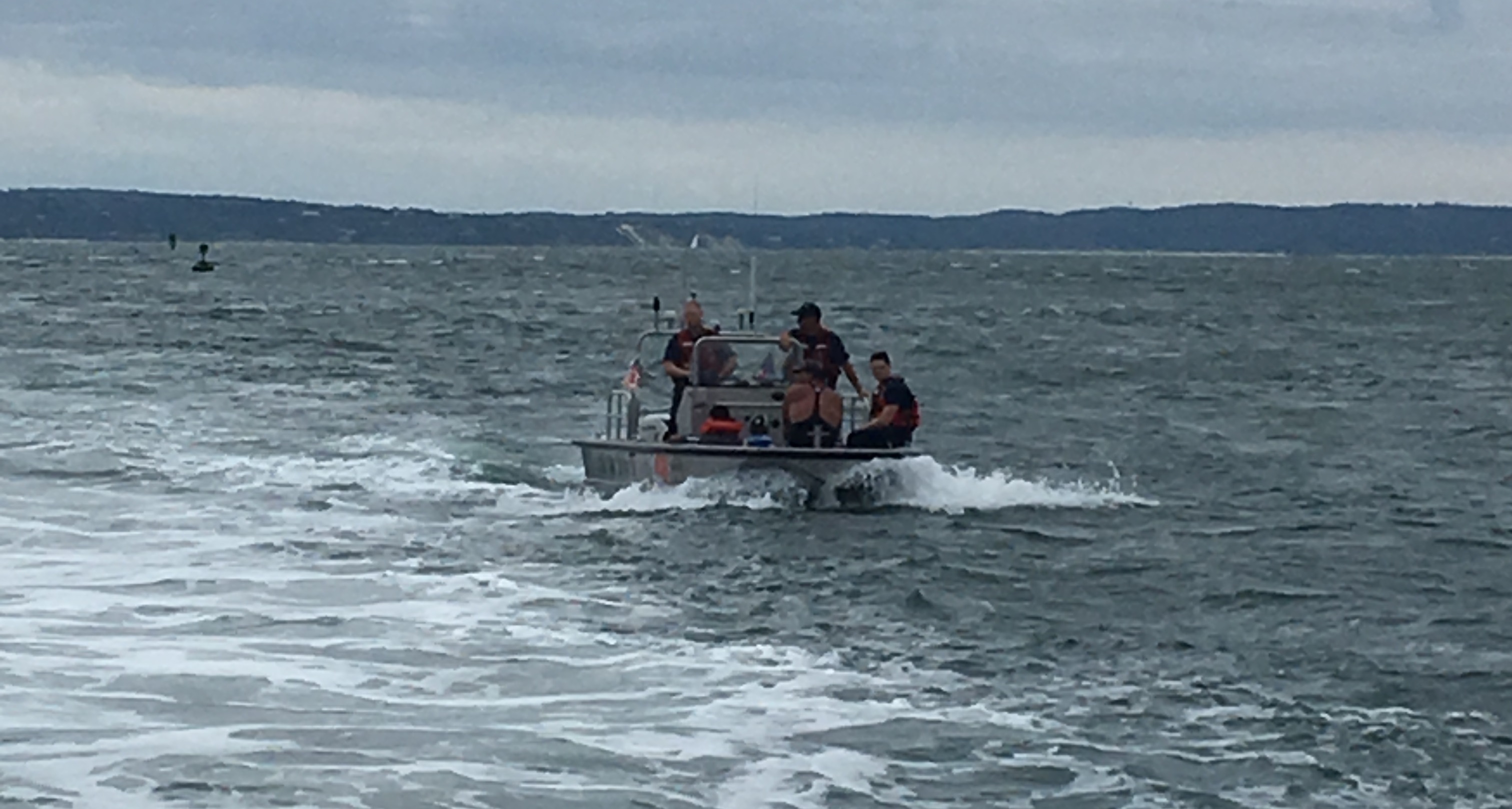 Four rescued after boat strands off Woods Hole