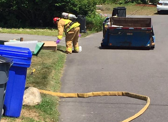 Smouldering substance from garbage truck prompts HazMat response to