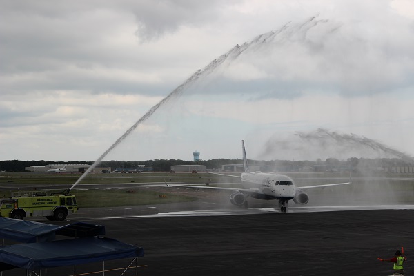 First Jet Blue Flight Arrives with Fanfare