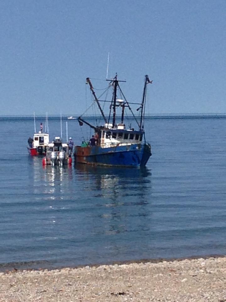 Fishing boat runs aground off Sandwich