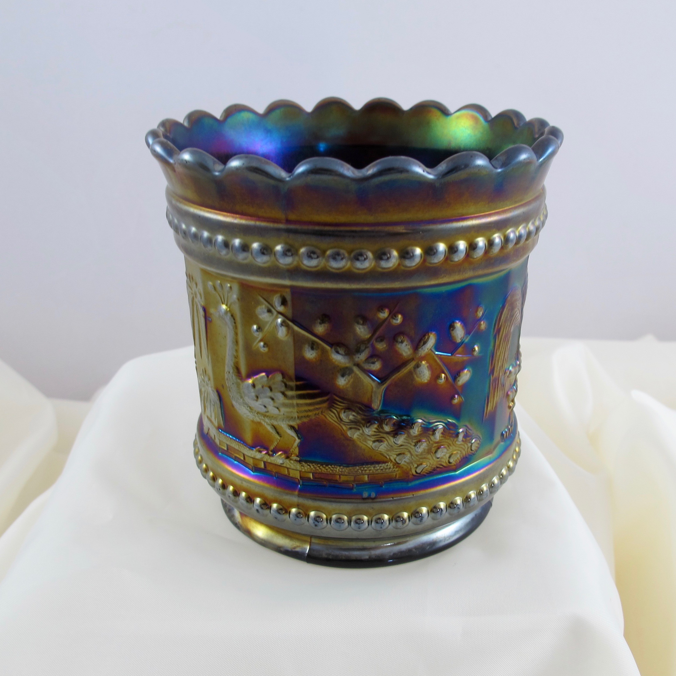 Antique Northwood Peacock at the Fountain Amethyst Carnival Glass