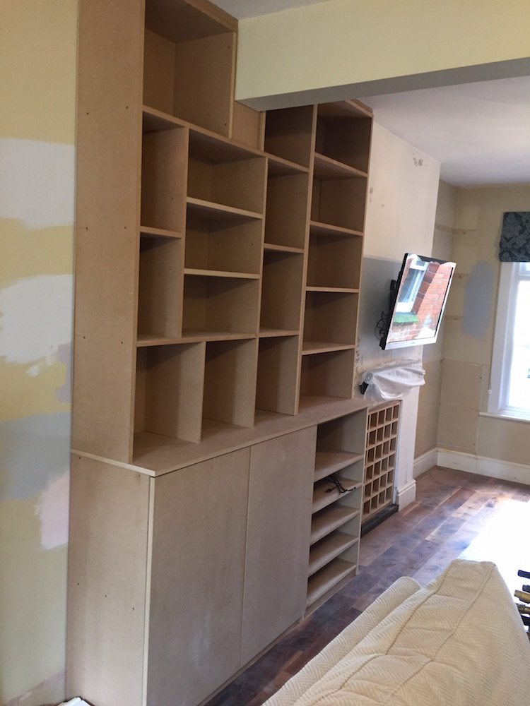 Bookcase & Fireplace Wine Rack Carpentry by Craig Ross
