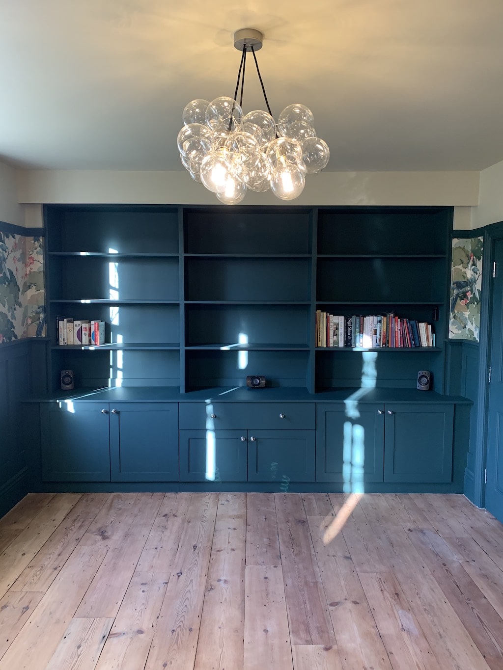 Bookcase with Projector Screen Carpentry by Craig Ross