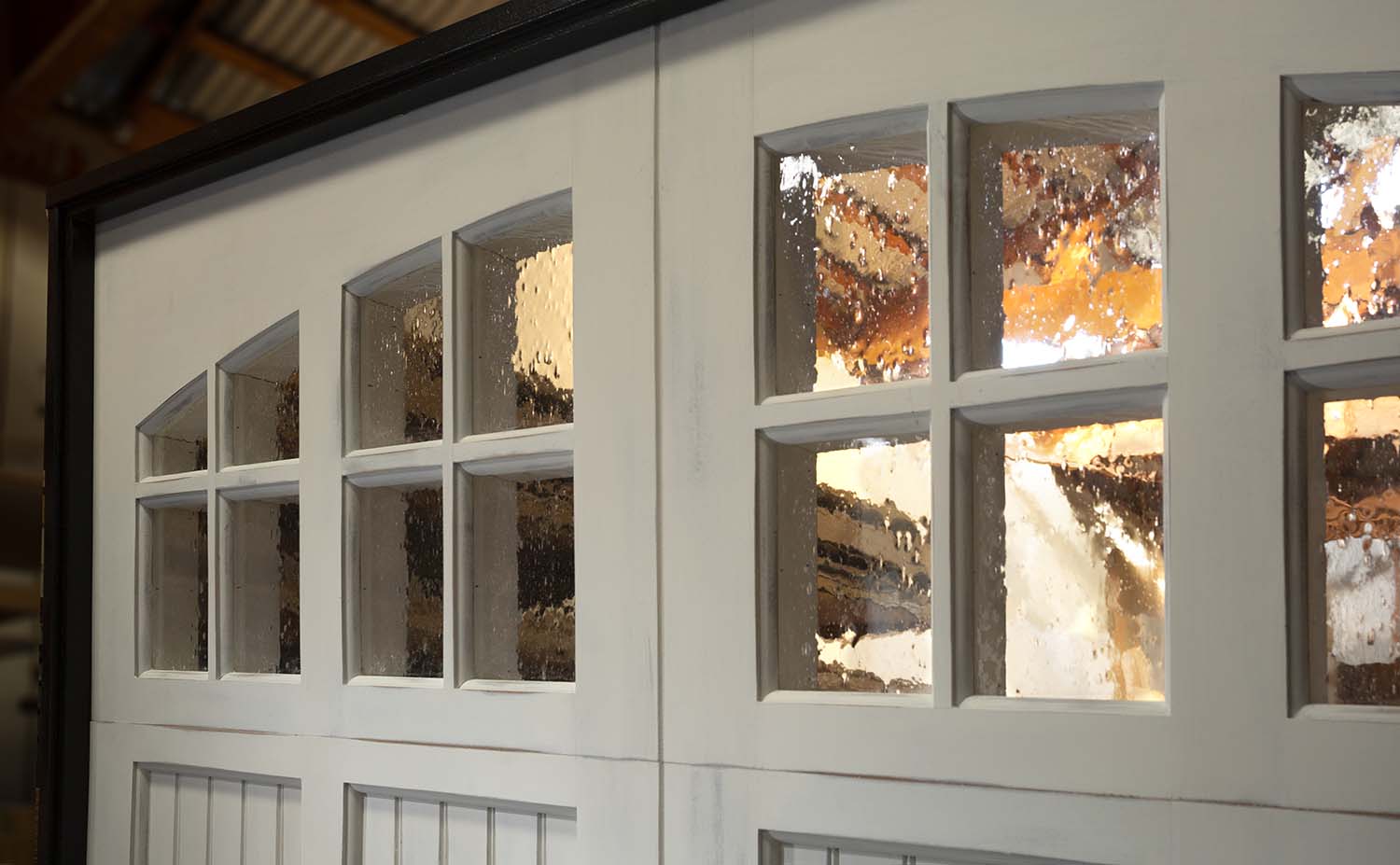 How to Properly Care for and Maintain Your Wood or Steel Garage Door