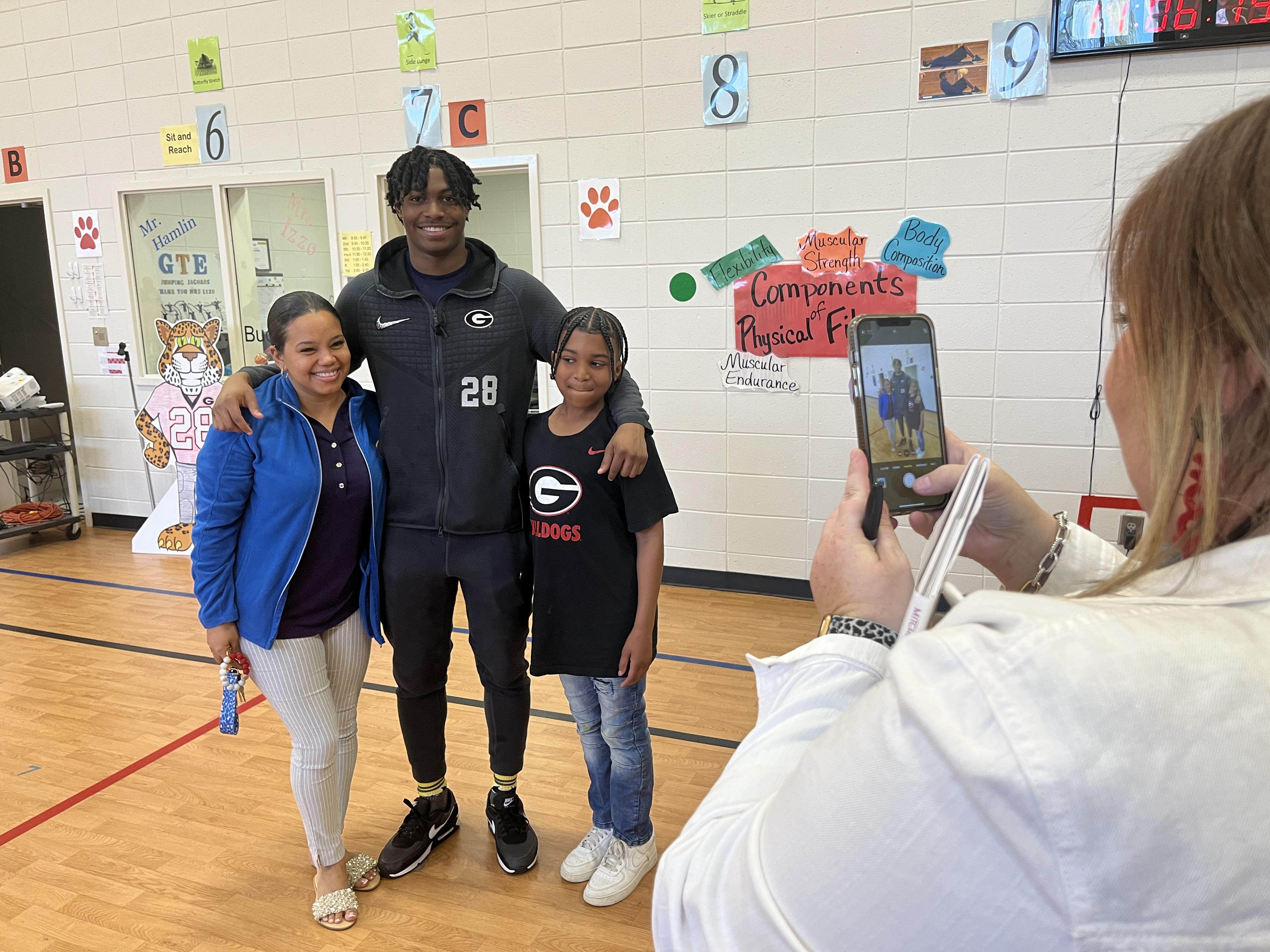 Grovetown High graduate spends spring break giving back to community