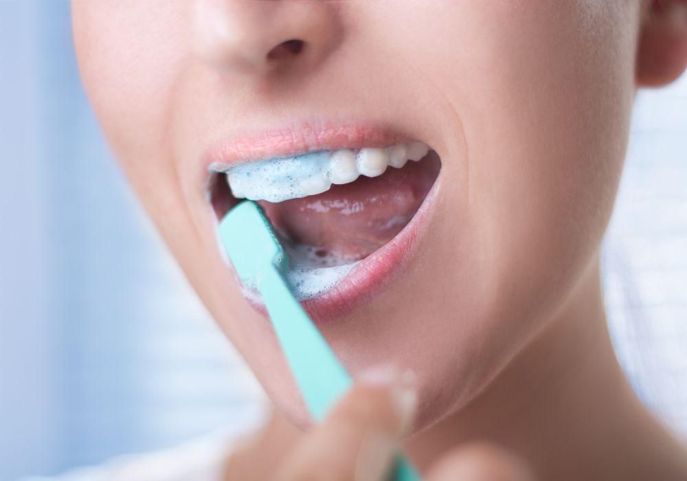 Can You Brush Your Teeth in Bed? Pros and Cons to Consider