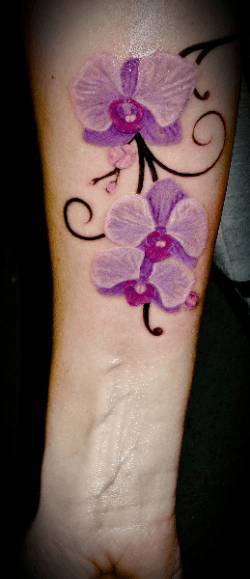 I Più Bei Tatuaggi Con Il Fiore Di Orchidea 579_x_250_jpg