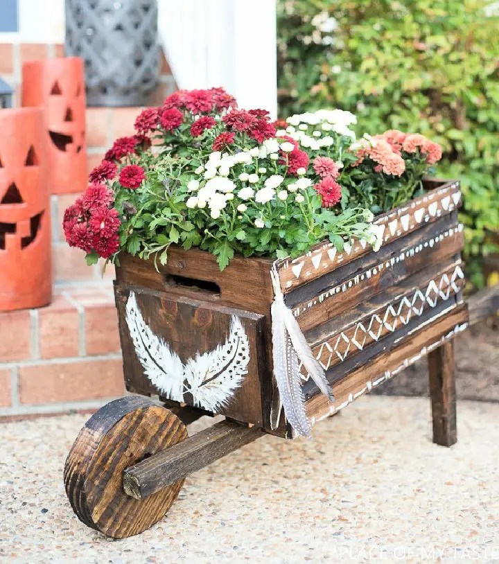 15 Amazing Wooden Wheelbarrow Planter Ideas