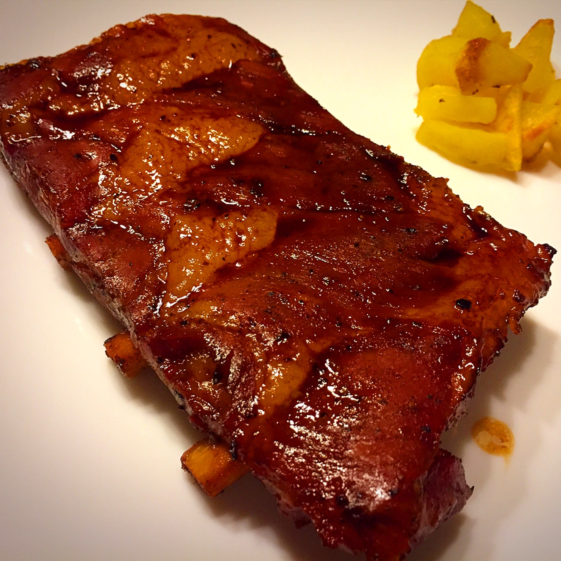 Costine cotte a bassa temperatura con salsa teriyaki e patate arrosto