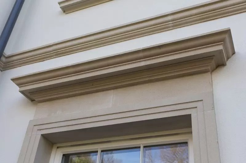 Chilstone_String_Course_Over_Cast_Stone_Window_Surround