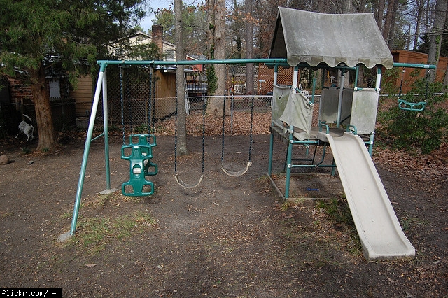 What's the best surface to put under a swingset in this area? (houses