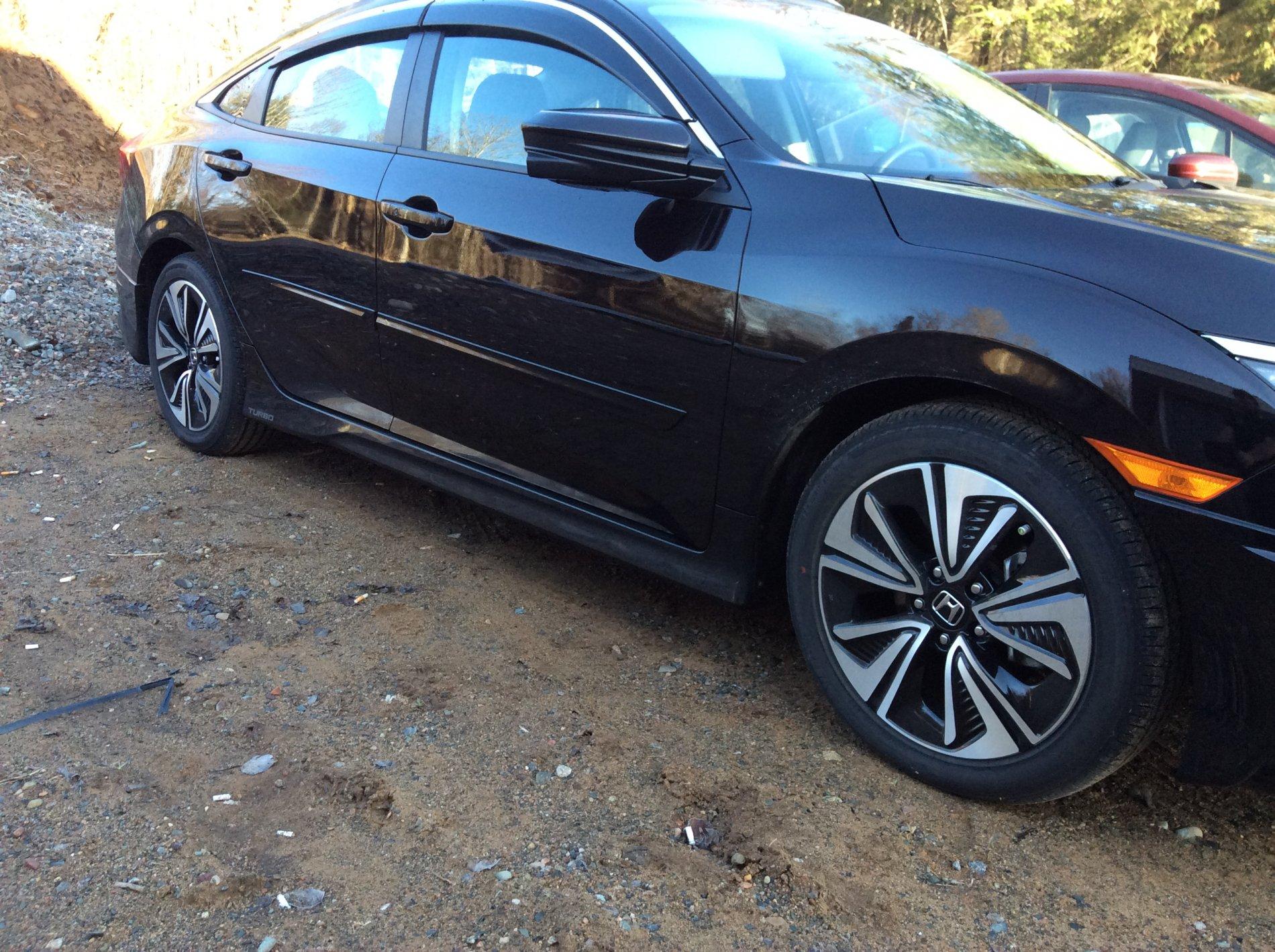 The Touring wheels look backwards to me is it easy to flip them