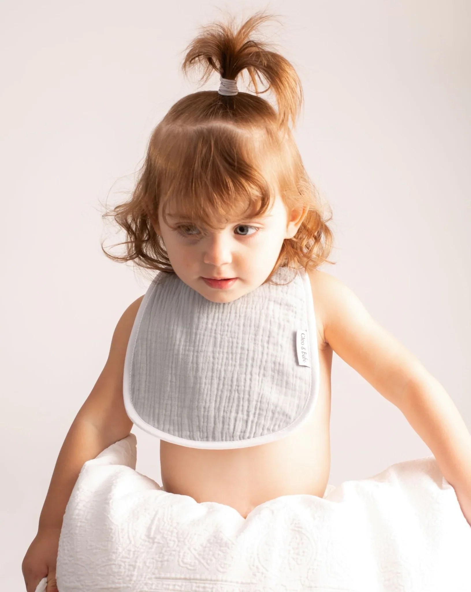 Staying Ahead Of SpitUps With Reflux Baby Bibs CLEO & BEBE