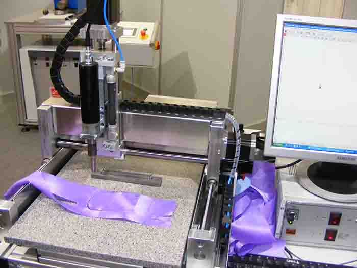 Ultrasonic welding and cutting with a machine by CNC STEP