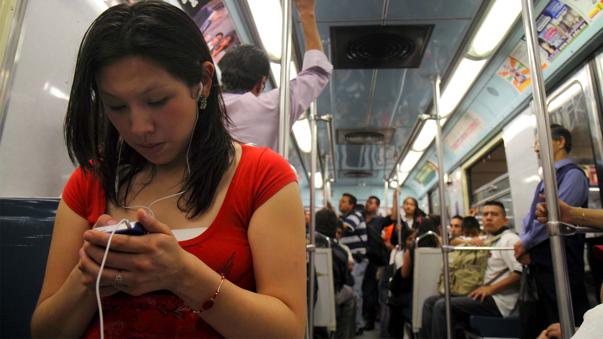 In Mexico, a controversial new law requires cell phone users to hand