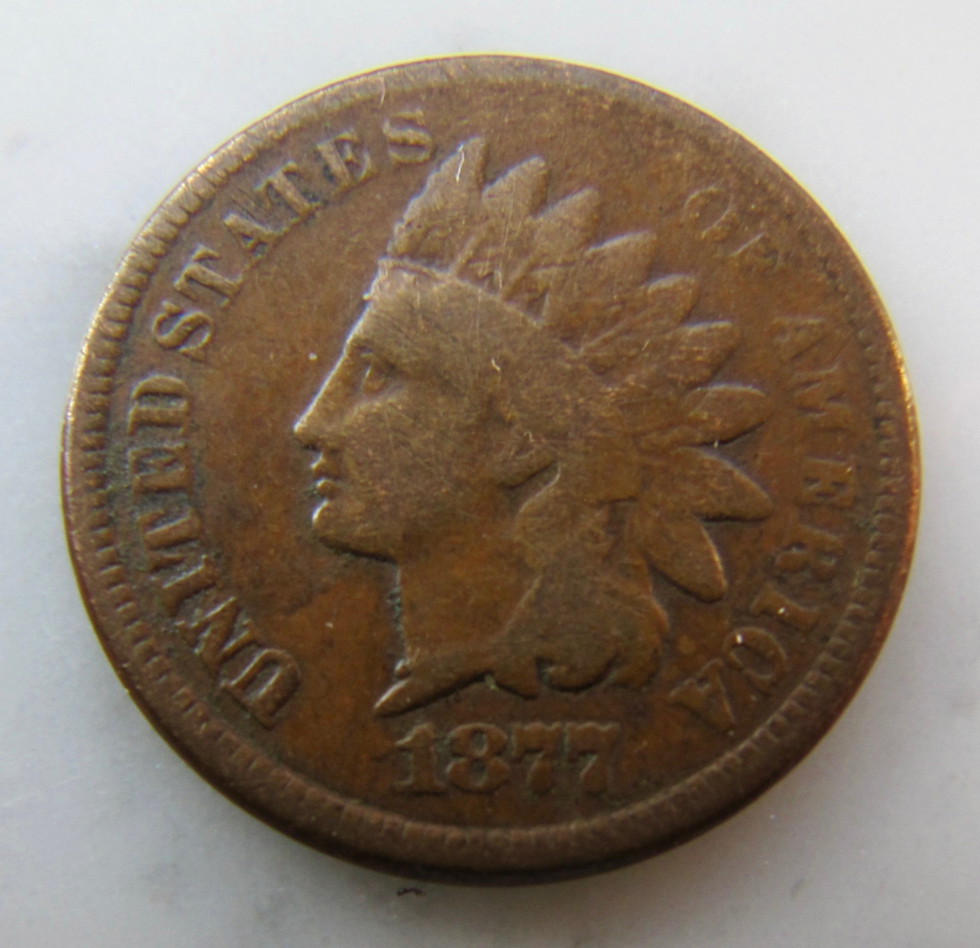 Please help me value this 1877 Indian Head Cent. Coin Talk