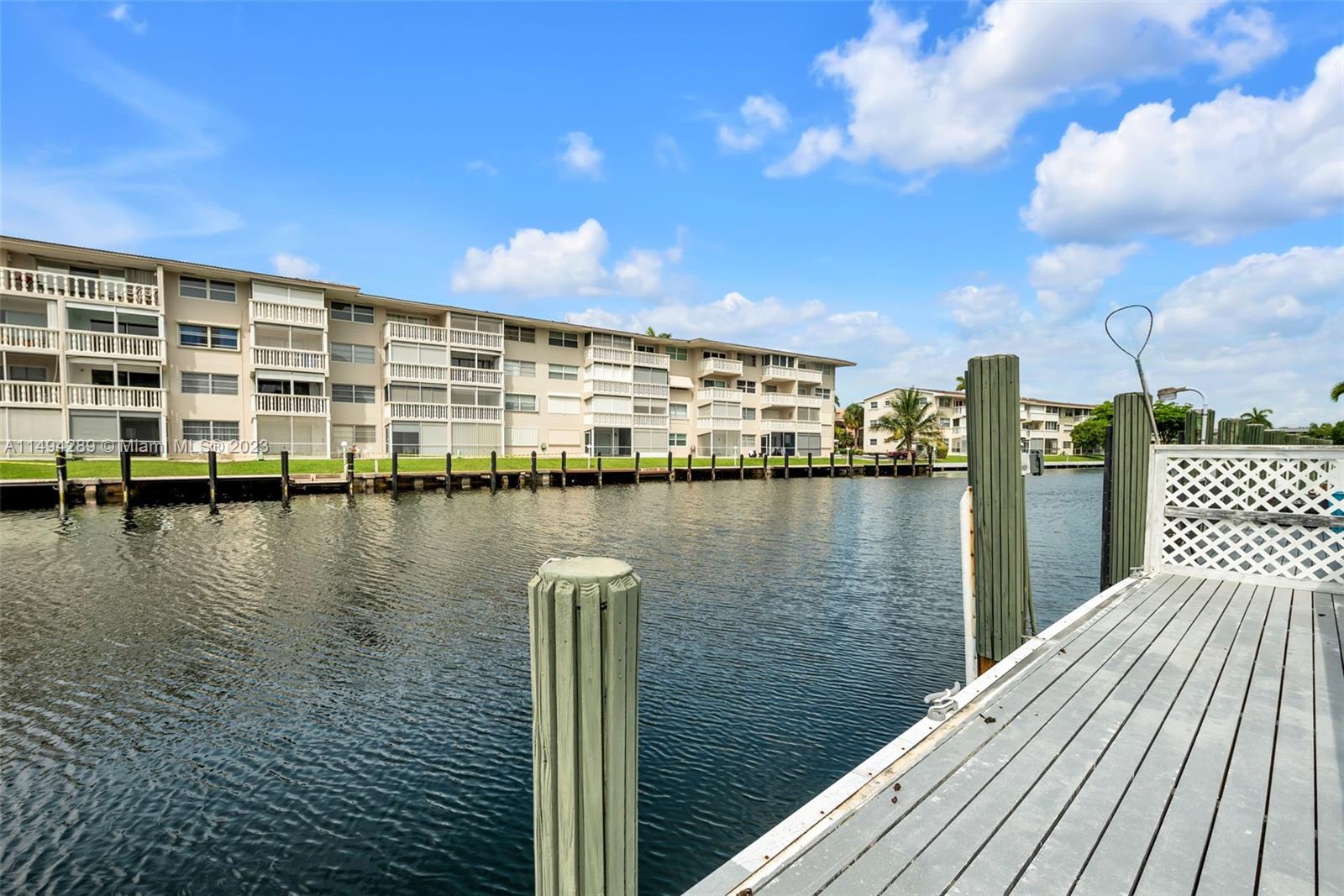 419 Golden Isles Drive, Unit 105, Hallandale Beach, FL 33009 Compass