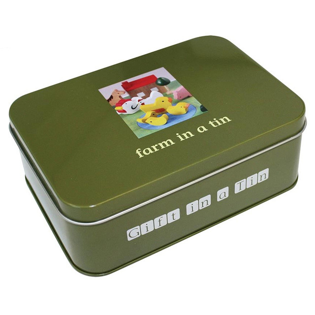 Farm in a Tin All the pieces fit together on the special grass farm mat!