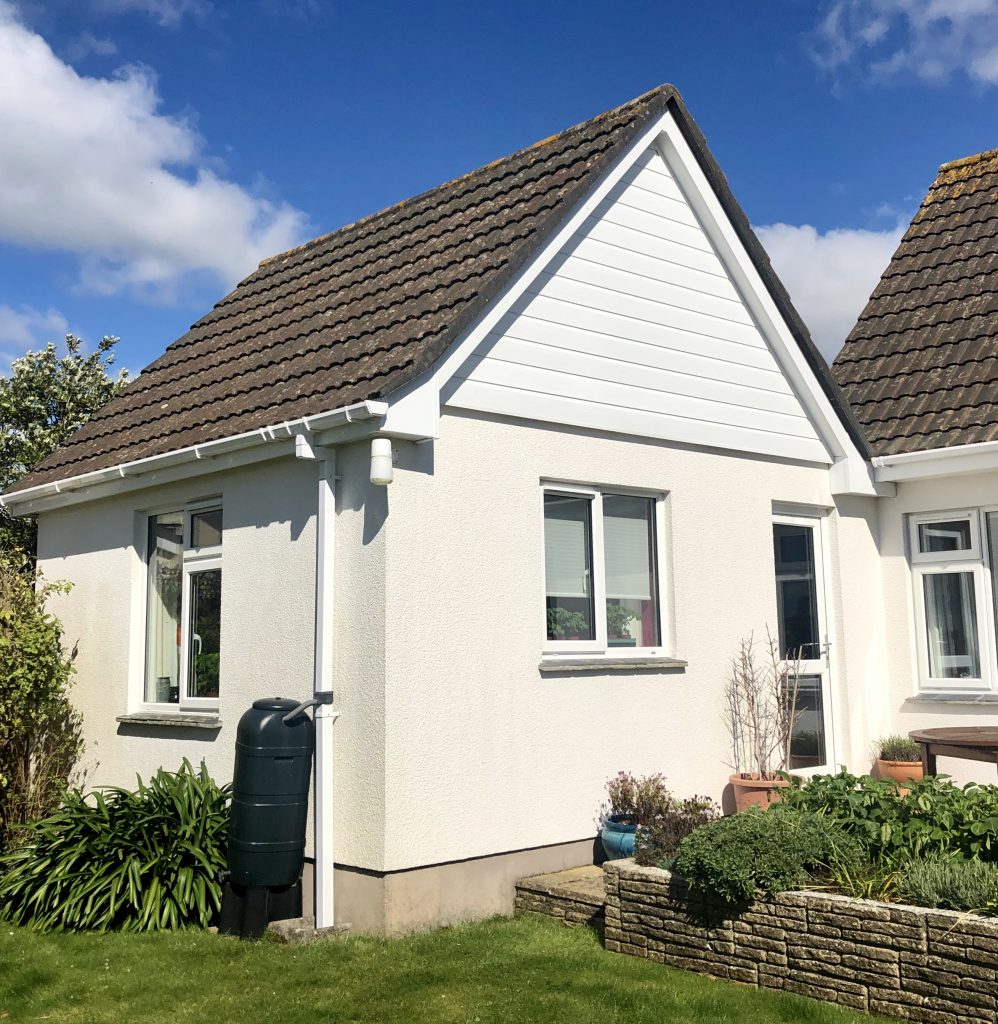 White Shiplap Cladding in Mullion. Cornwall Elite Cladding
