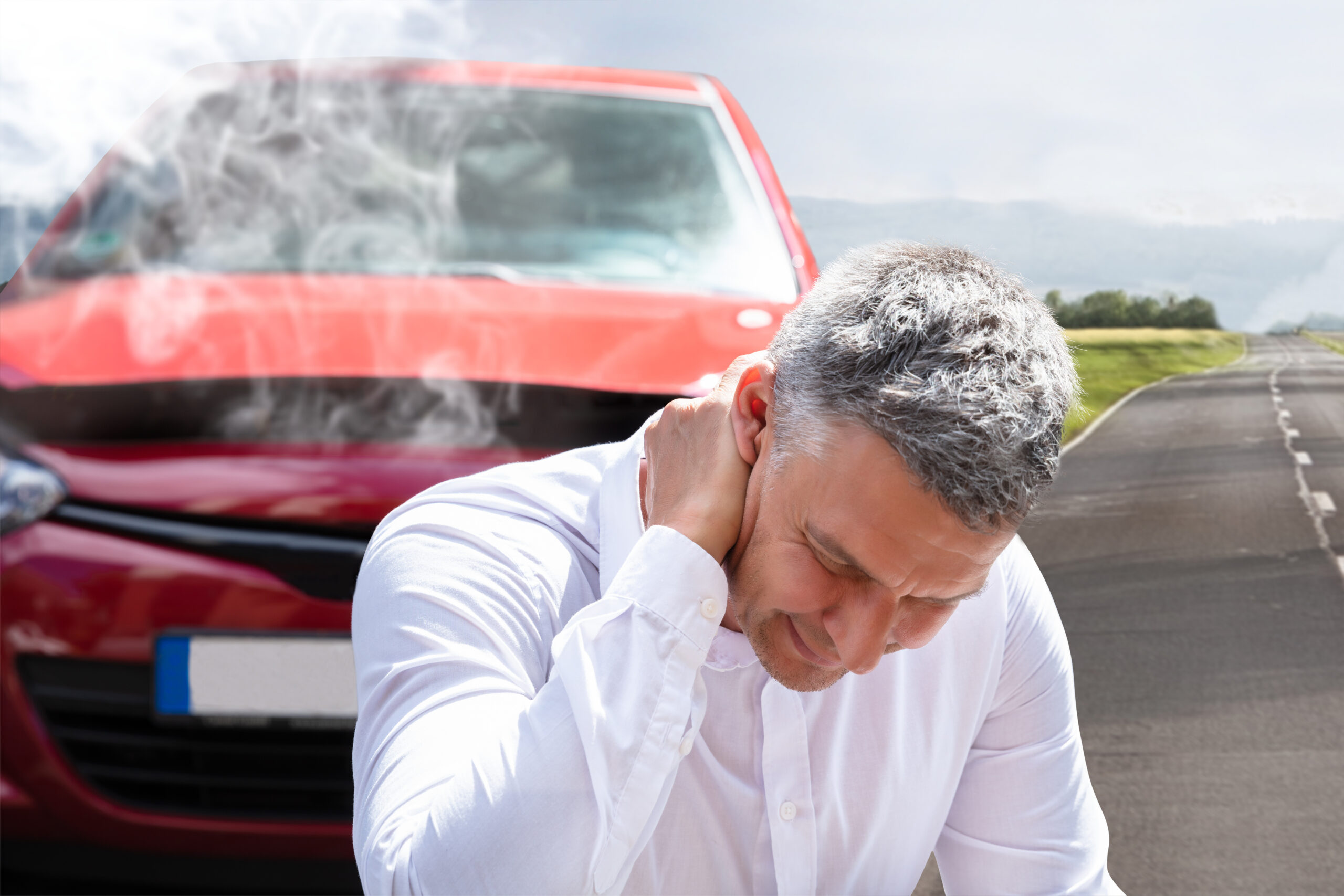 Man Suffering From Neck Pain In Front Of Breakdown Car Chiropractor