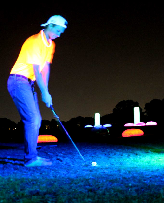 Night golf at the Cosmic Driving range Cosmic Driving Range