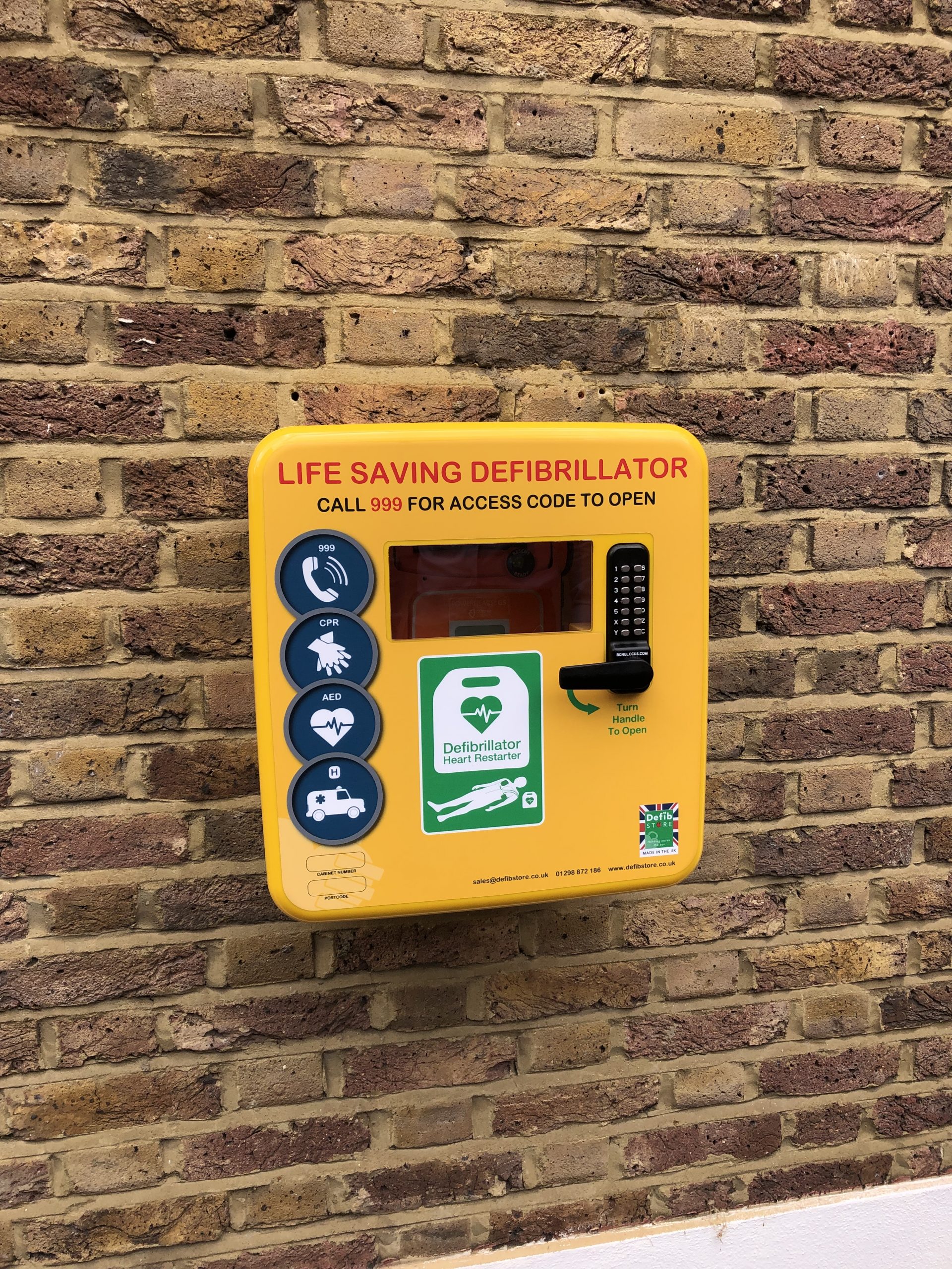 CRASH installs lifesaving defibrillator at West London office for