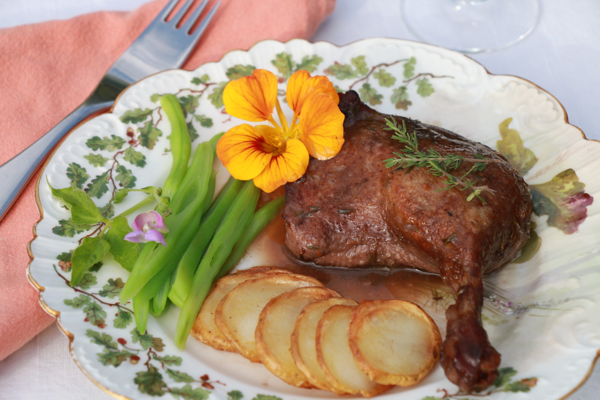 Duck legs braised in red wine Crumbs on the Table