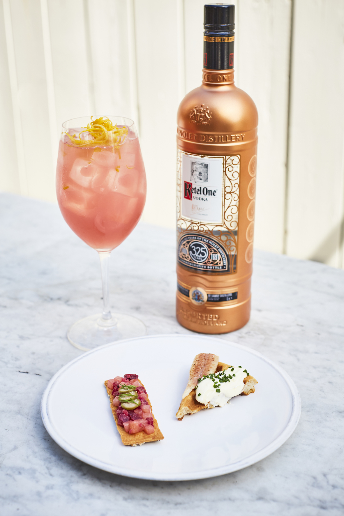 Ketel One 325 bottle with cocktail