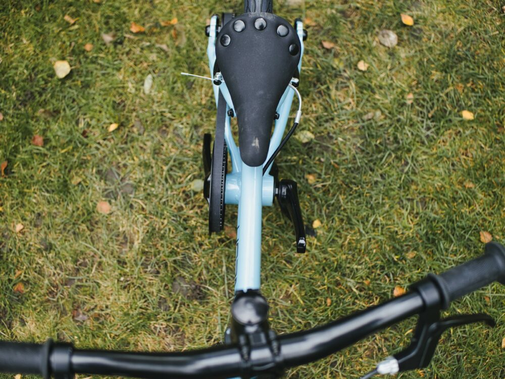 Removing the pedals from the cranks of a kids bike helps them to learn