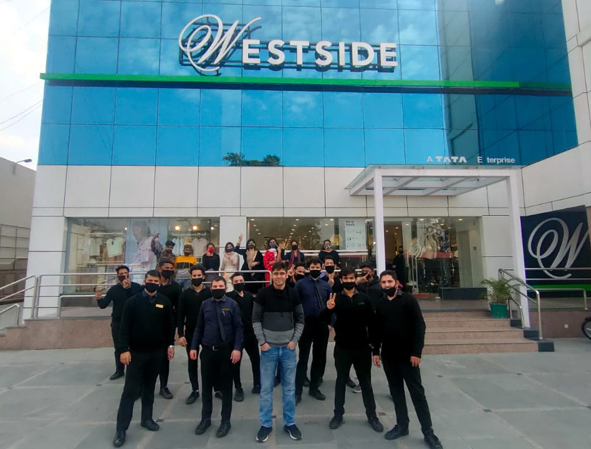 Westside team posing for a group photograph during celebration of 12th