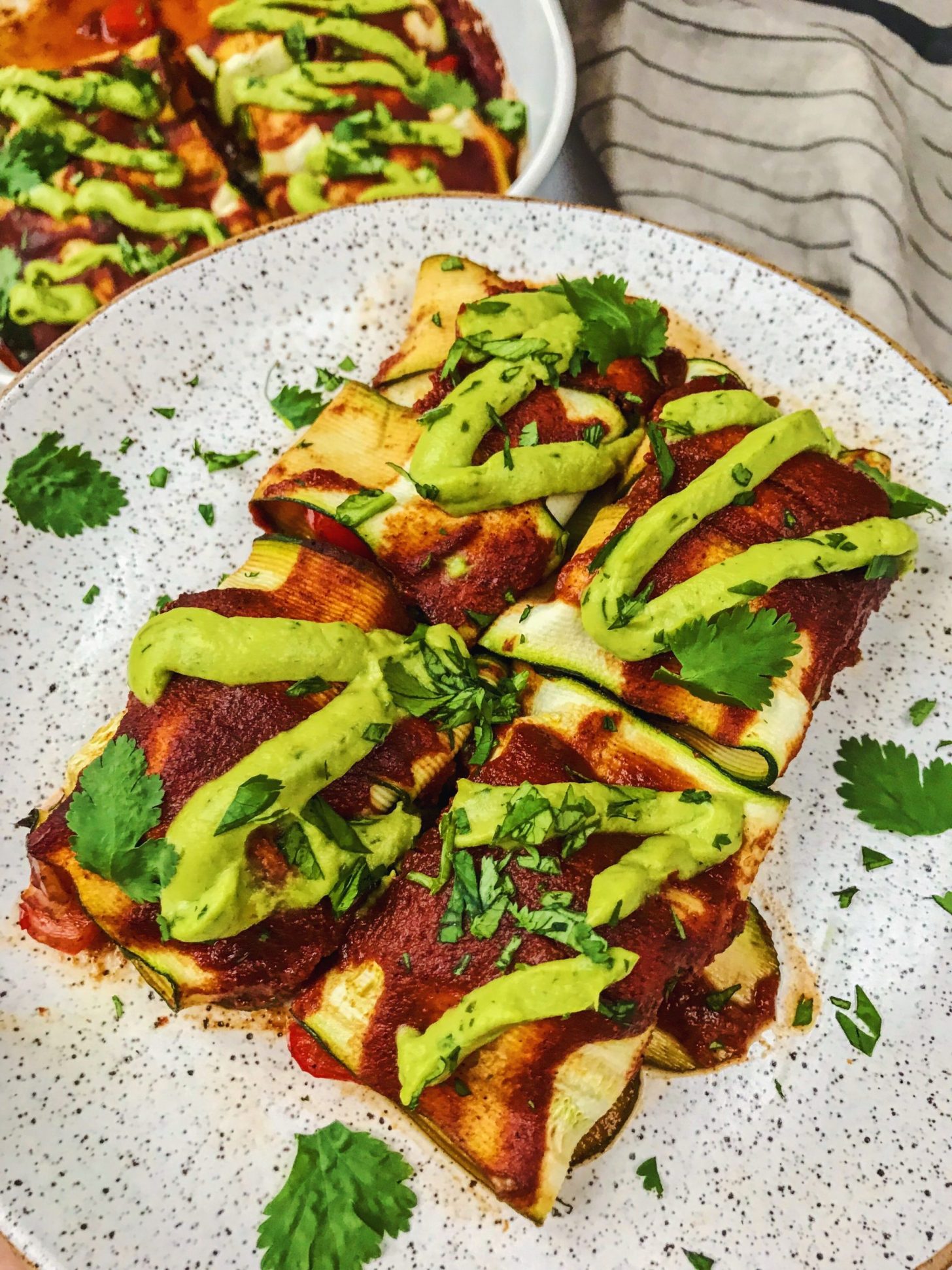 Zucchini Enchiladas with Avocado Cilantro Cream Sauce • Daisybeet
