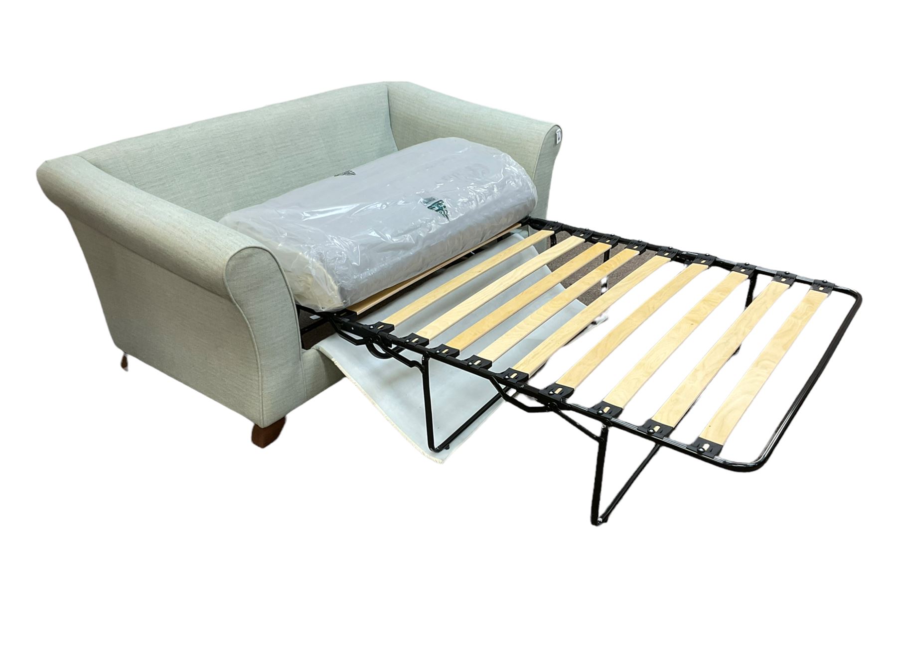 Marks & Spencer Home two seat sofa bed, metal spring action, upholstered in light blue fabric
