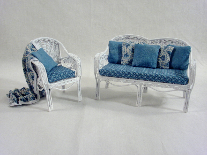 White Wicker Living Room Furniture Dressed in Blue